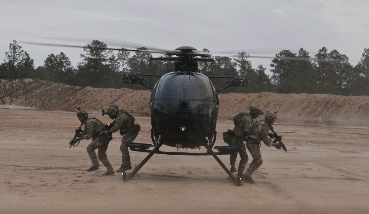 Team dismounting a little bird on the range